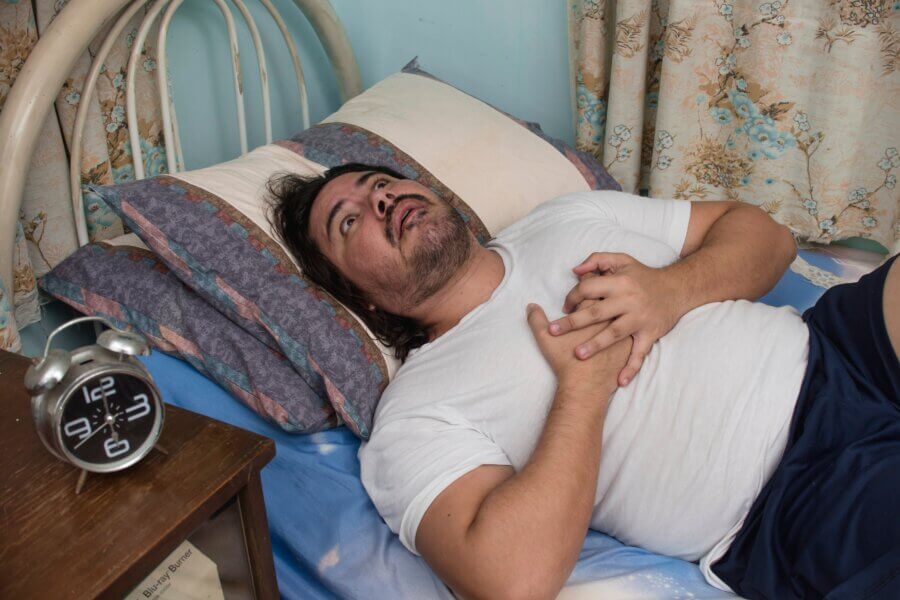 Orthopnoe bezieht sich auf das Symptom, Atemnot im Liegen
